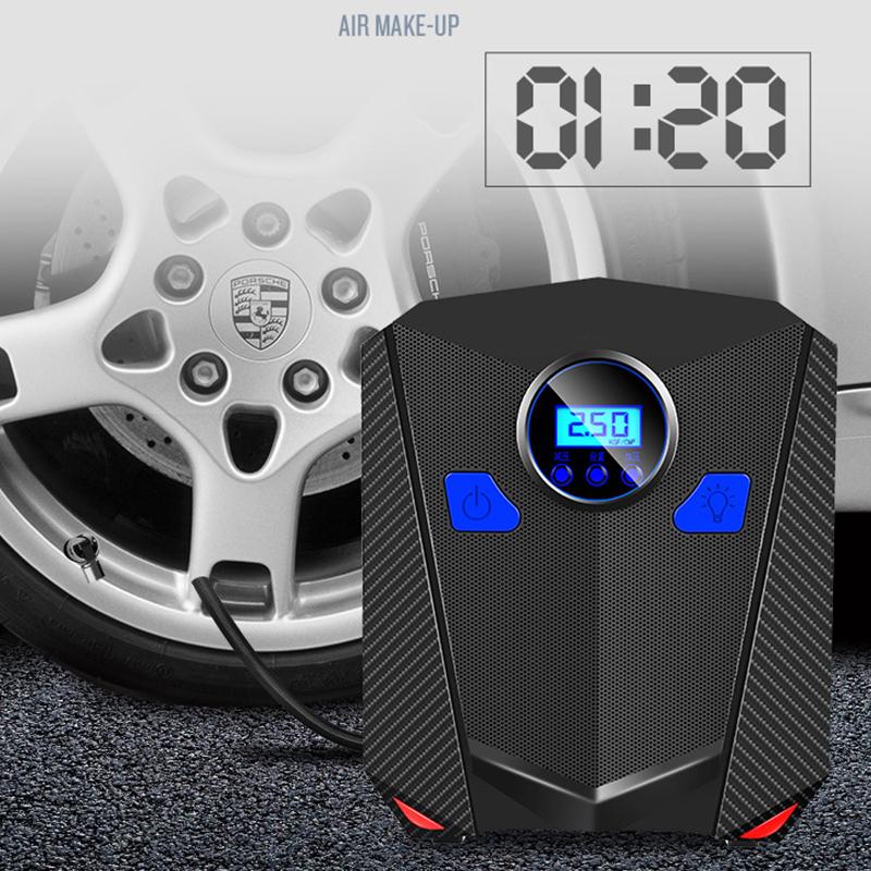 Car air compressor with digital display in front of a car tire