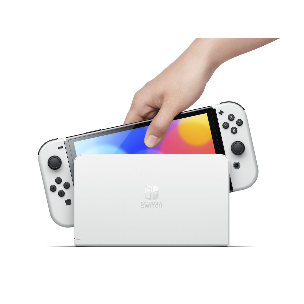 Hand holding a Nintendo Switch console with a colorful screen on a white background