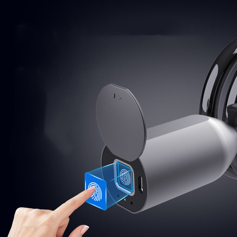Hand interacting with a futuristic device on a dark background