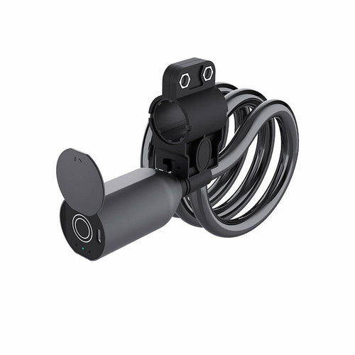 Black security camera with coil spring on a white background