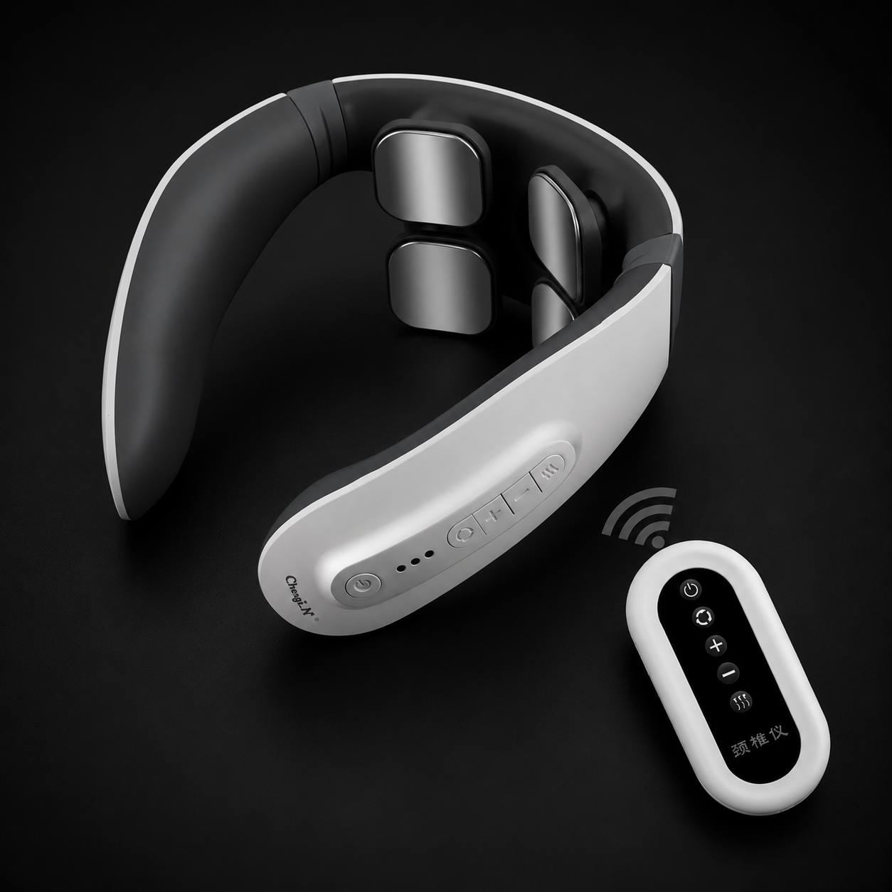 A neck and shoulder massager with a white and dark gray design, shown alongside its matching wireless remote control on a dark background.