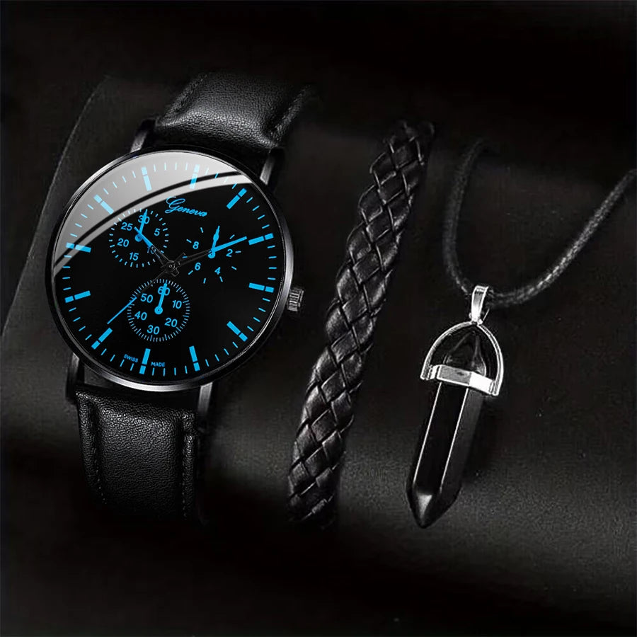 Black leather watch with blue glowing face and a black braided strap, alongside a silver pendant necklace on a dark background.