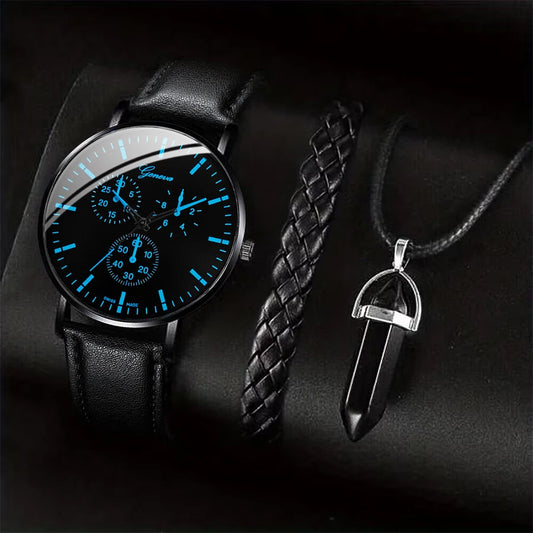 Black leather watch with blue glowing face and a black braided strap, alongside a silver pendant necklace on a dark background.