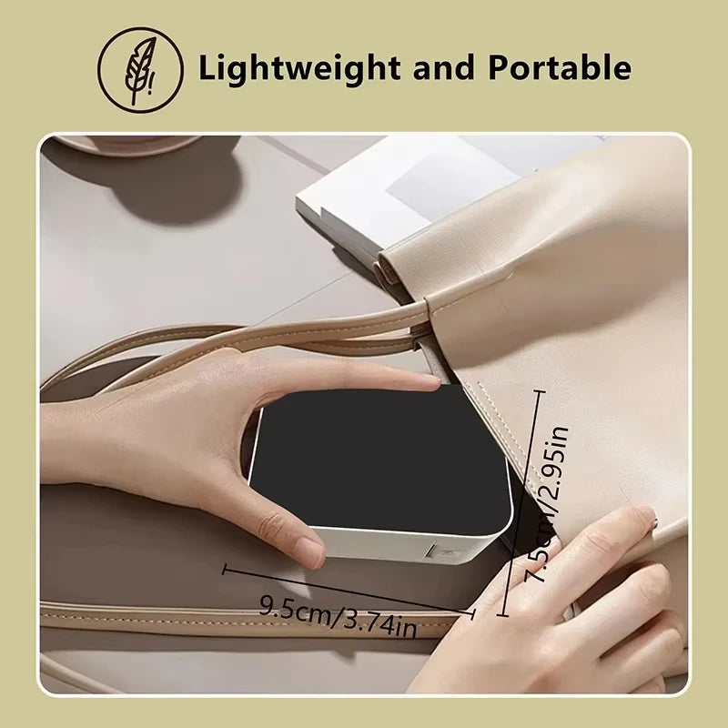 Hand holding a small black device next to a beige handbag, with text indicating 'Lightweight and Portable'.