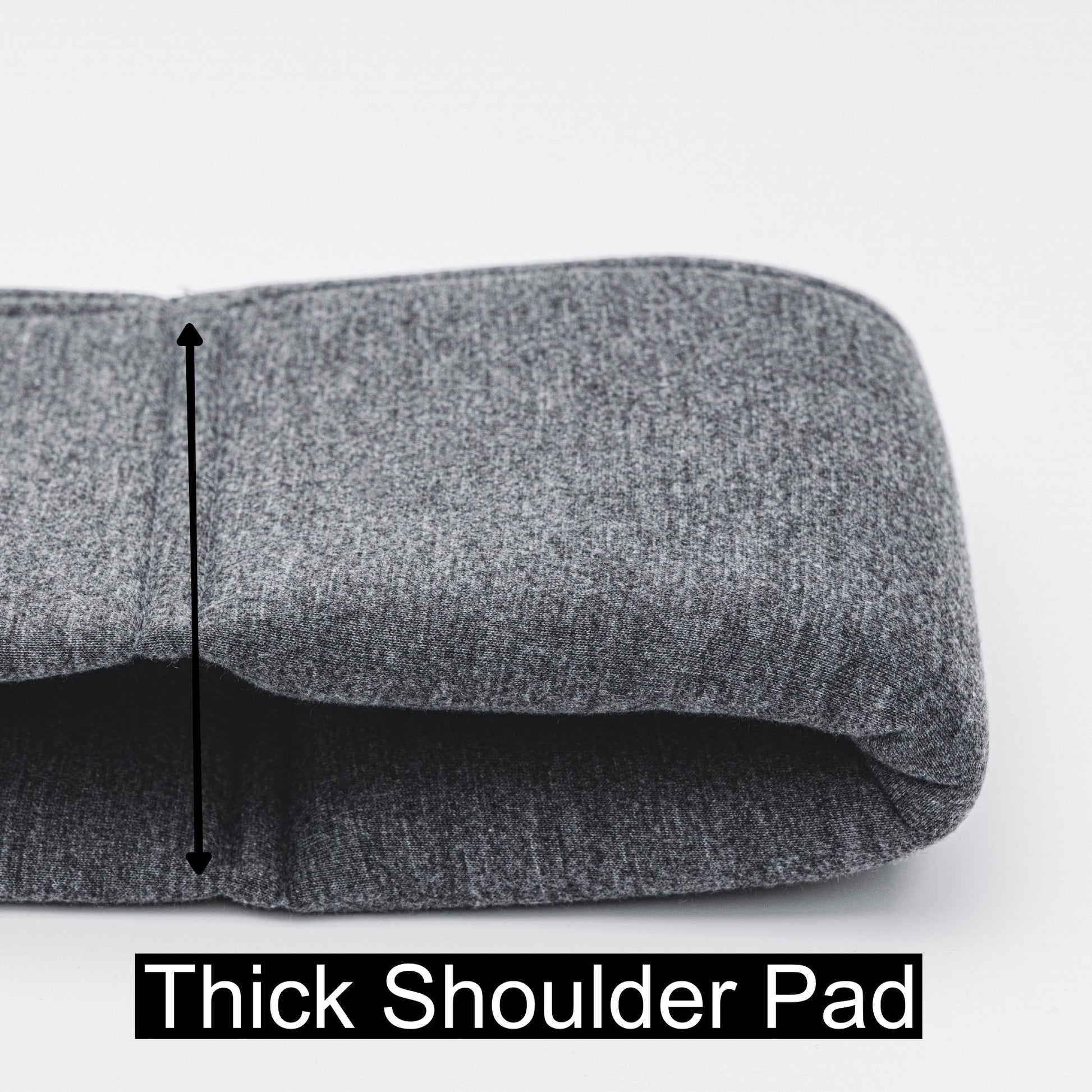Gray shoulder pad with a thick padding feature on a white background