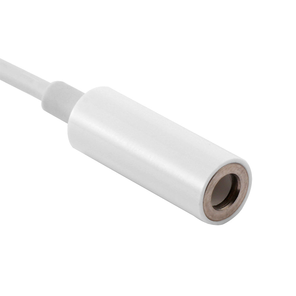 White audio cable connector on a white background