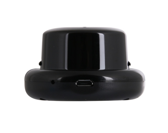 Black cylindrical device on a white background