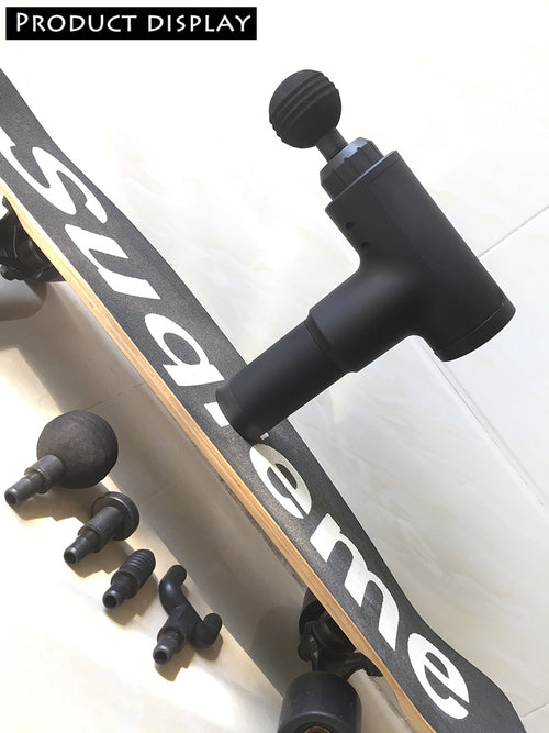 Black massage gun on a skateboard with 'Supreme' branding