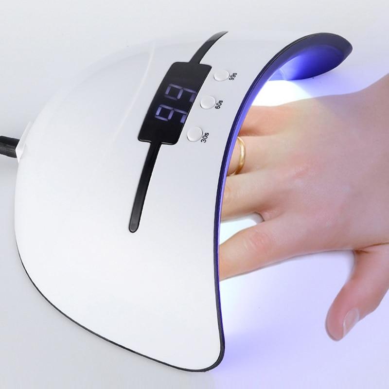 Nail dryer with a digital display on a white background