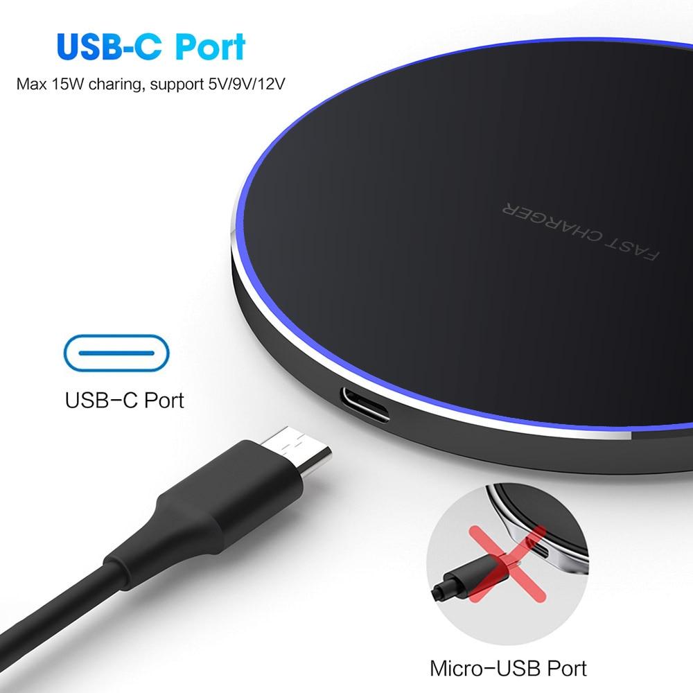 Black wireless charger with USB-C port and cable on a white background